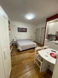 Voodi või voodid majutusasutuse B&B La Fisarmonica toas