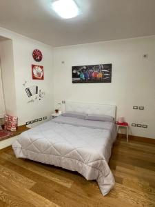 Voodi või voodid majutusasutuse B&B La Fisarmonica toas