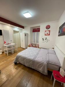 Postel nebo postele na pokoji v ubytování B&B La Fisarmonica
