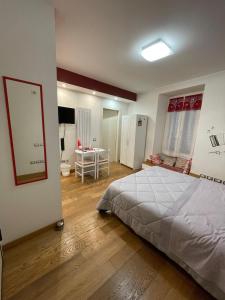 Postel nebo postele na pokoji v ubytování B&B La Fisarmonica + 37 fotografií