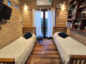 Μια τηλεόραση ή/και κέντρο ψυχαγωγίας στο Hospedajes JUJUY