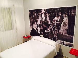 Postel nebo postele na pokoji v ubytování Hotel Sur Utopia