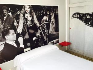 Postel nebo postele na pokoji v ubytování Hotel Sur Utopia