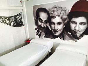 Postel nebo postele na pokoji v ubytování Hotel Sur Utopia