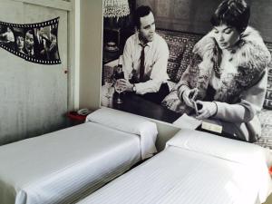 Postel nebo postele na pokoji v ubytování Hotel Sur Utopia