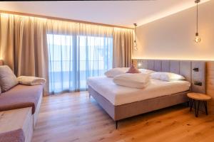 Voodi või voodid majutusasutuse Hotel Lindnerhof toas