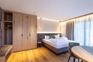 Voodi või voodid majutusasutuse Hotel Lindnerhof toas