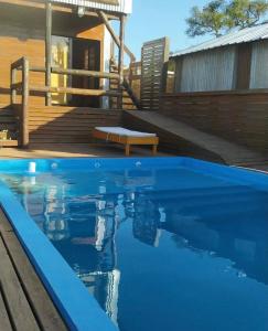 Πισίνα στο ή κοντά στο CABAÑA EN ISLA SANTIAGO con PISCINA