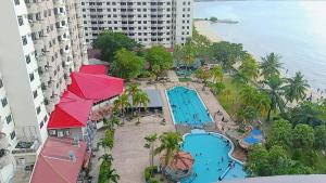an aerial view of a resort with a swimming pool at Jev Penthouse in Port Dickson +17 photos