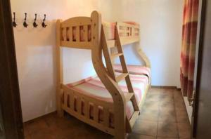 a pair of bunk beds in a room at Naturaleza-confort in Arroyo Frio +9 photos