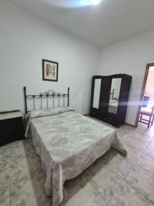 Ένα ή περισσότερα κρεβάτια σε δωμάτιο στο Chalet Santo Domingo