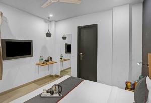 TV a/nebo společenská místnost v ubytování Townhouse Nangal Raya Pankha Road