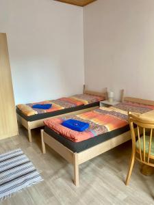 Postel nebo postele na pokoji v ubytování Apartmány u koupaliště + 10 fotografií