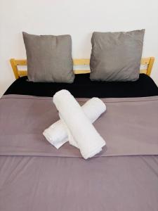 Postel nebo postele na pokoji v ubytování T2 confortable à Acajou Lamentin