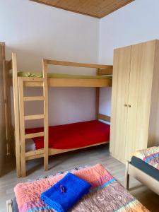 Postel nebo postele na pokoji v ubytování Apartmány u koupaliště