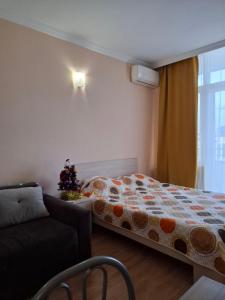 Postel nebo postele na pokoji v ubytování Батуми-вид на море