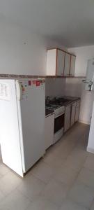 Kuchyň nebo kuchyňský kout v ubytování Departamento Trapalco + 1 fotografie