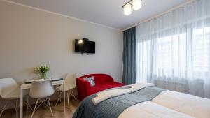 Posteľ alebo postele v izbe v ubytovaní ARKA Medical SPA 708 z widokiem na morze
