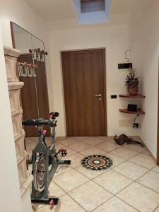 Fitness centrum a/nebo fitness zařízení v ubytování Mansarda Serena + 8 fotografií