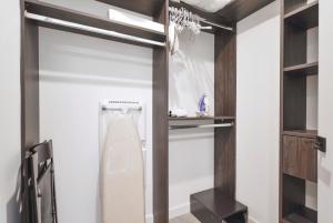 a walk in shower in a bathroom with a glass door at Great Miami Stay Steps from Bayside & the Beach in Miami +12 photos
