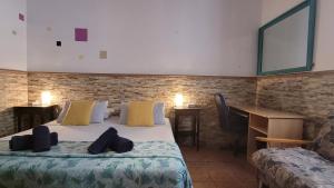 Letto o letti in una camera di Eden GuestHouse