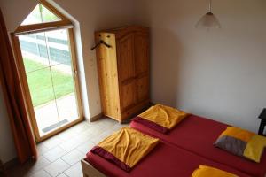 Кровать или кровати в номере Maison Abricot et Orange