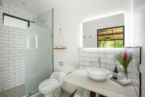 Vannituba majutusasutuses Makanas Beach Bungalows