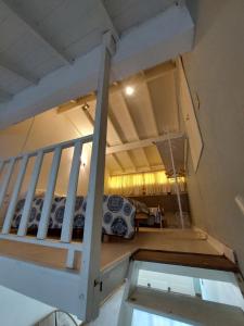 Giường trong phòng chung tại Departamento bonito y práctico!