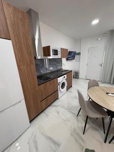 Kuchyň nebo kuchyňský kout v ubytování P&C APARTMENTS - Complejo Pintor Zurbarán