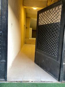 an open door to a room with a hallway at Isis Pyramids View Inn in Cairo