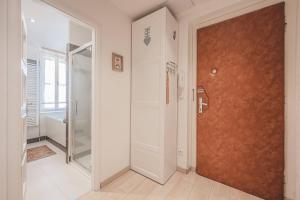 a bathroom with a walk in shower and a glass door at 1BD Apartment on Masarykovo Square - Bathtube, Desk & Chair, Free Wi-Fi in Hradec Králové +14 photos