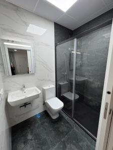 Koupelna v ubytování P&C APARTMENTS - Complejo Pintor Zurbarán