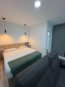 Postel nebo postele na pokoji v ubytování P&C APARTMENTS - Complejo Pintor Zurbarán