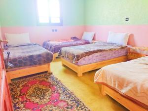 Postel nebo postele na pokoji v ubytování Gîte akioud mazik + 24 fotografií