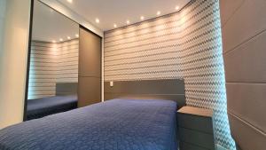 Postel nebo postele na pokoji v ubytování Unique 2304 - Vista Linda para o Mar