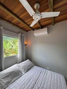 En eller flere senge i et værelse på Recanto do Paraíso + 26 billeder