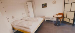 Postel nebo postele na pokoji v ubytování Apartmány Pěkná 10