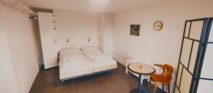 Postel nebo postele na pokoji v ubytování Apartmány Pěkná 10