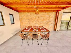 Fotografie z fotogalerie ubytování ANESSIS Villas and Suites v destinaci Kalamaki