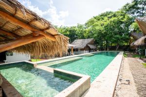 Bazén v ubytování LA QUEBRADA ECO LODGE Hotel Boutique nebo v jeho okolí