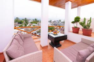 Posezení v ubytování EXCLUSIVE CONDO GALAPAGOS and BEYOND 1