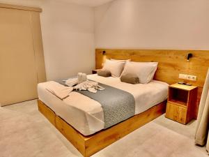 Postel nebo postele na pokoji v ubytování ANESSIS Villas and Suites