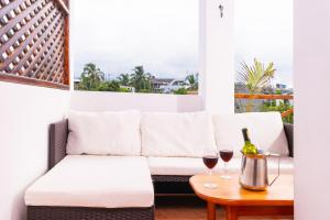 Posezení v ubytování EXCLUSIVE CONDO GALAPAGOS and BEYOND 1