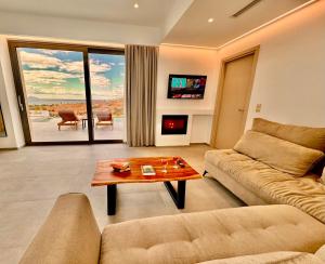 Posezení v ubytování ANESSIS Villas and Suites