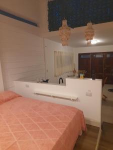 Postel nebo postele na pokoji v ubytování La Ola Zen