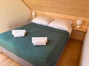 Gościejówka na skraju lasu客房内的一张或多张床位