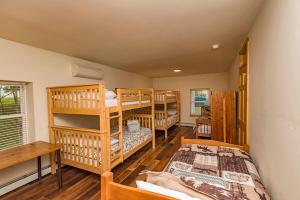 Ένα ή περισσότερα κρεβάτια σε δωμάτιο στο 5Bedrooms,BigBoulder&JackFrost Ski, Hottub,SplitRock WaterPk,Linens! +46 φωτογραφίες