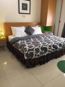 Katil atau katil-katil dalam bilik di Greens Manor VI