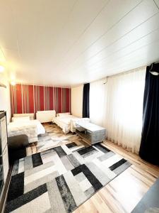 En eller flere senge i et værelse på Wiesbaden Mainz kleines Haus mit Garten Grill