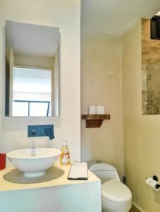 Ένα μπάνιο στο sunrise 203 Cozy Studio in Aldea Zama Beach Access! +14 φωτογραφίες